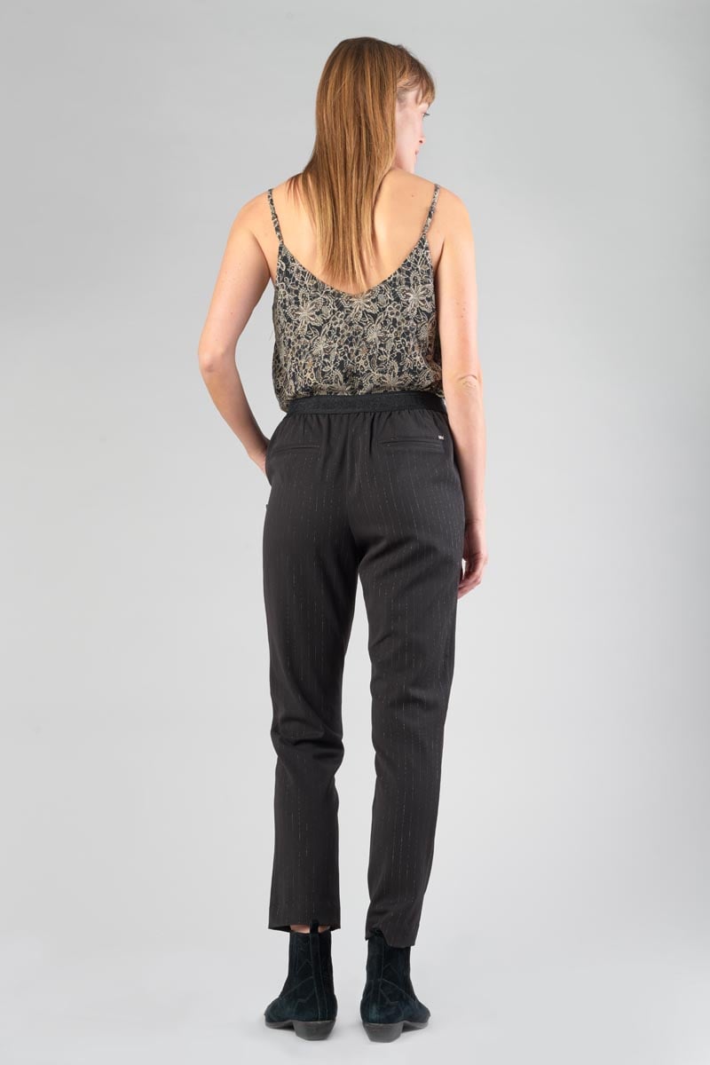 Black Livia trousers with asymmetric fastening