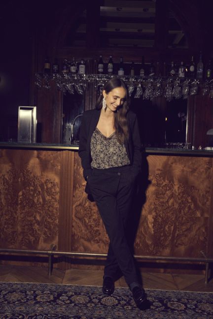 Black Livia trousers with asymmetric fastening