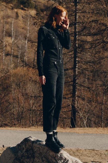 Faded black denim Cosa jumpsuit with asymmetric fastening